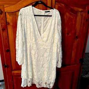 White long sleeve lace dress New. Never worn.